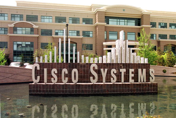 SAN JOSE, CA - APRIL 17, 2001: (FILE PHOTO) The facade of a building on Cisco Systems' sprawling complex is shown April 17, 2001 in San Jose, California. Analysts expect Cisco Systems to post a 13 cents-per-share profit February 4, 2003 for the second quarter. (Photo by Dan Krauss/Getty Images)